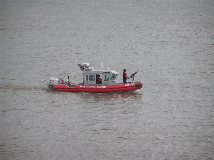 This coast guard boat was going around by the ship...look at the machine gun!