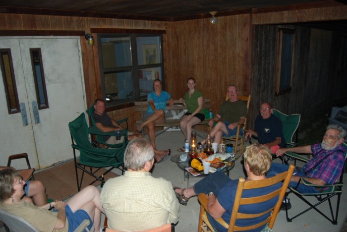 Hanging out on our porch.  From lower right around counterclockwise:  Susan, Emery, Gail, Don, Don, Father Joe, Emily, Amy, and Ron.