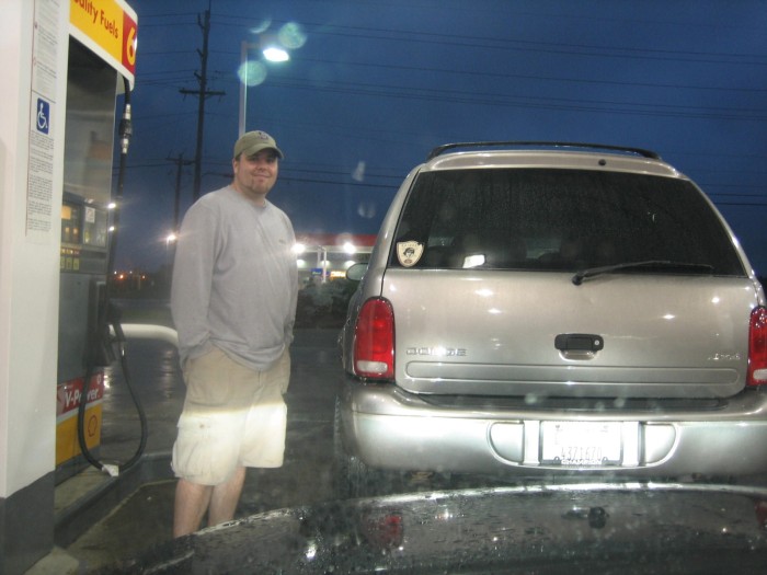 Emily snapped this pic of me filling up the tank.  Wow...I can finally use 87 octane again! (talon took 93)