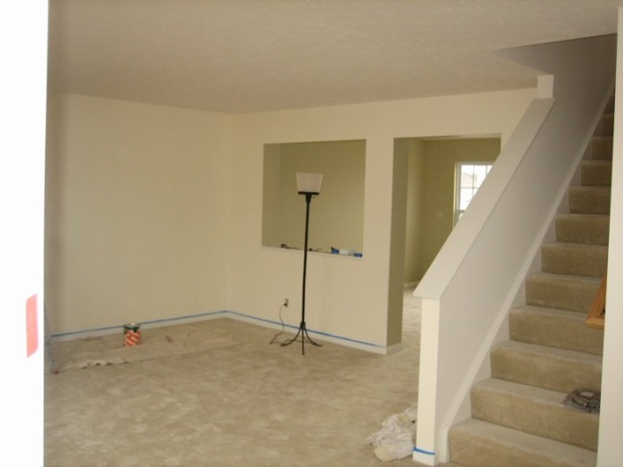 Looking from kitchen into living room, painted cream and front room 