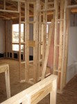 From master bedroom, looking into upstairs hallway (guest bathroom on right, linen closet (middle), extra bedroom (left)