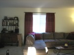 Living room curtains; same color as our kitchen walls!  Nice find Diana!