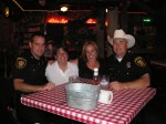 Becky and Ana with a couple of Texas Rangers.  Chuck Norris was not around.
