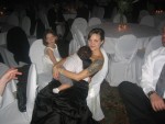 This little guy (Heather's nephew?) passed out on Danielle pretty early in the evening :-)