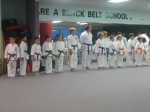 Jordan (Jim's daughter) is the girl with a green belt