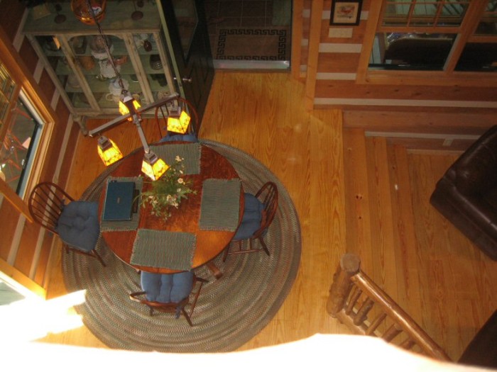 Looking down to the dining room from the loft