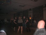 Some people we don't know dancing.  The lady in the black and red must have been a fan of 