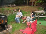 Emily, Meg and Colleen sitting by the fire