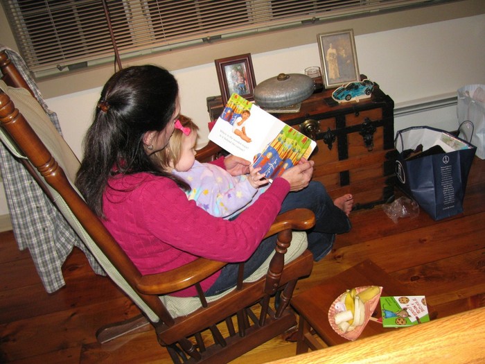 Lilly getting read to by Oma.  Lillian adores books.