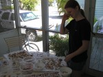 Emily checking over her days collection of shells.  No Jabobia yet!