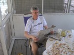 Phil and his hobby - reading the paper.