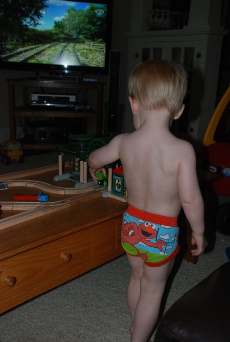 Sean hangin' out in his underwear, playing trains.