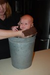 Little boy in a sap bucket (Grandma Diana made him do this one)