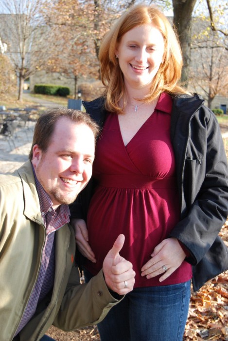 Paul showing off his handiwork (Emily's pregnant belly)