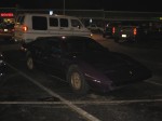 This was a purple (!!) Ferrari 308 GTS we saw in the parking lot near the liquor store.  It had a neon tube hanging down from the front bumper.  The lady caught me taking pics of it.  I asked her if it was real and she said it was.  Those still look like Pontiac Fiero wheels though.