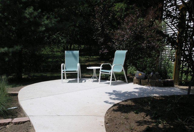 The new patio with two new chairs and table