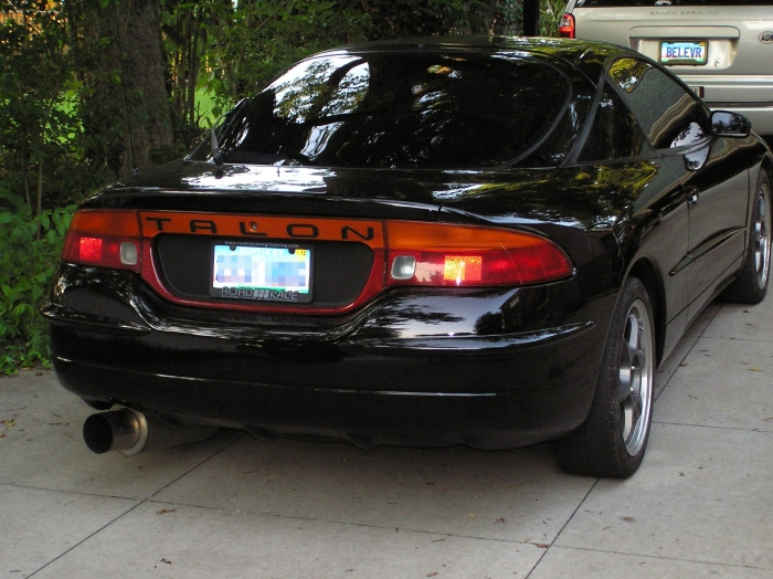 rear shot of the car...yes it needs rear tires (have some).  The eagle tsi awd stickers are on their way.  Spoiler is waiting on a gasket from the dealer.