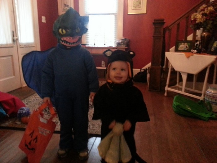 Sean is Toothless the Dragon (thanks to uncle sean for finding the costume!) and Lillian is a black cat (made by Diana for Sean when he was 2)