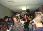 Jeremy in the strips fleeing the mayhem in the north hall outside Turley's classroom.  Jason (?) crowd surfing.