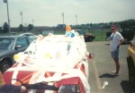 Our class of 93 girls Tabitah (hidden corner) and Jolee decorate our car for Senior Day 94.  Note the big black bra.